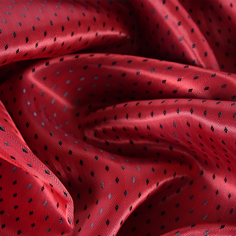 Ткань с мелкой ромбовидной сеткой с саржевым дном с рисунком «елочка» PV