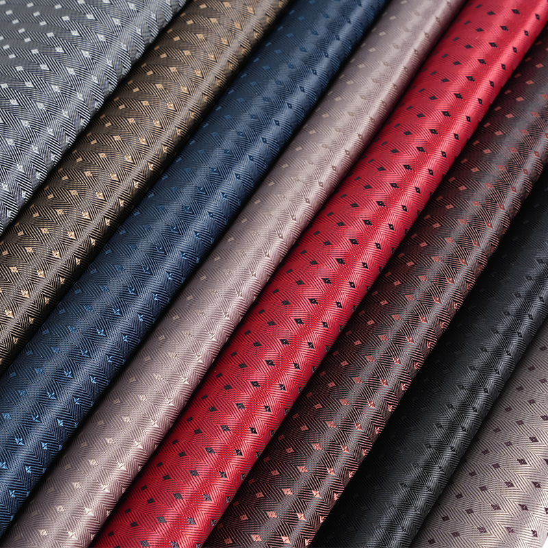 Ткань с мелкой ромбовидной сеткой с саржевым дном с рисунком «елочка» PV