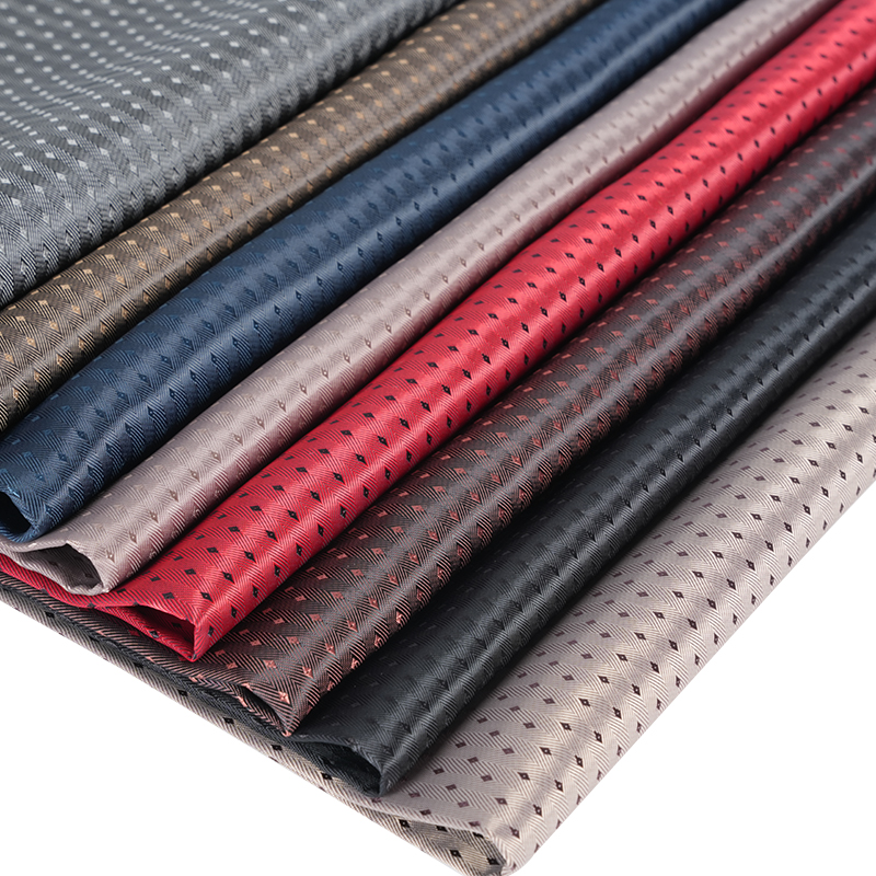 Ткань с мелкой ромбовидной сеткой с саржевым дном с рисунком «елочка» PV